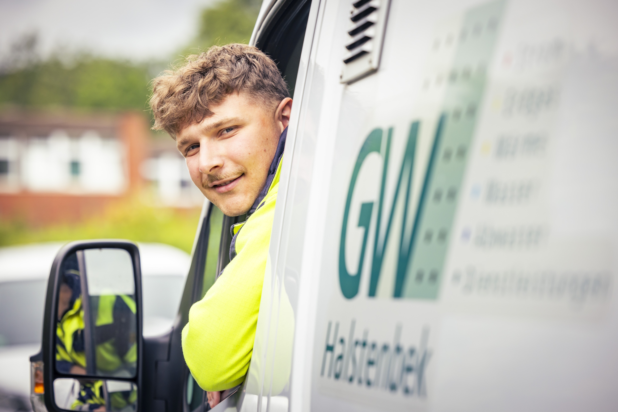 Mitarbeiter im GWH-Fahrzeug